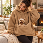 Vetsuno Cozy Carrier Hoodie in khaki with a small dog resting in the integrated pouch at home
