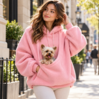 Vetsuno Cozy Carrier Hoodie in pink worn outdoors with a small dog in the front pouch