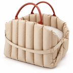 Vetsuno NestRide beige padded pet carrier bed on white background