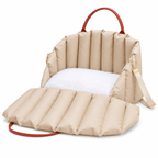 Vetsuno NestRide beige pet carrier opened into a padded resting bed