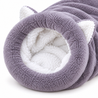 Close-up of the Vetsuno PurrNest gray plush entrance and soft white fleece lining